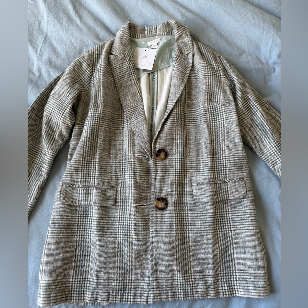 Plaid blazer with polka dot accent